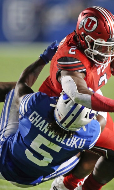 Moss runs for TD, No. 14 Utah beats BYU 30-12 in opener